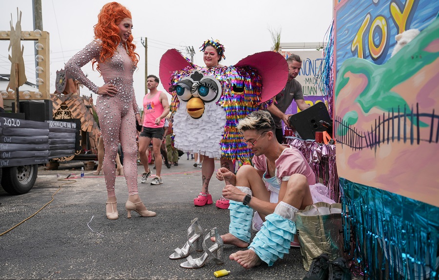 Provincetown Carnival Parade: Land of Toys with many Barbie dolls