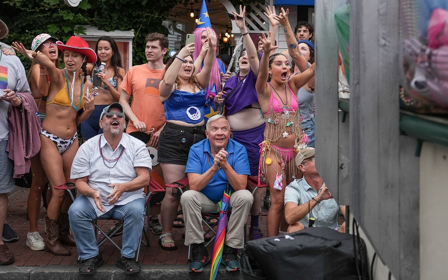 Provincetown Carnival Parade: Land of Toys with many Barbie dolls